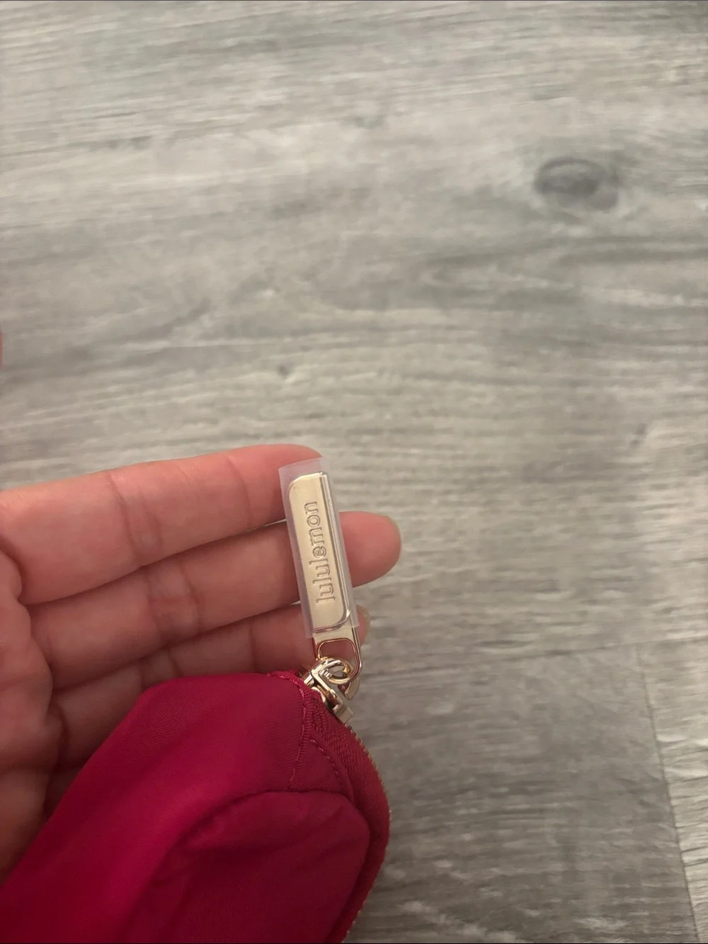 lululemon athletica zip cosmetic pouch in deep pink with gold hardware